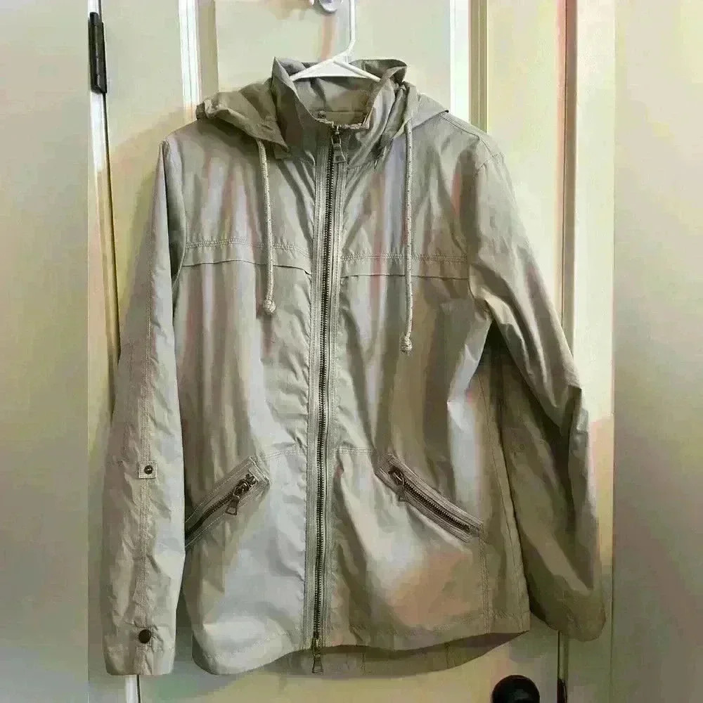 Woman’s tan ANORAK size small take anywhere jacket.